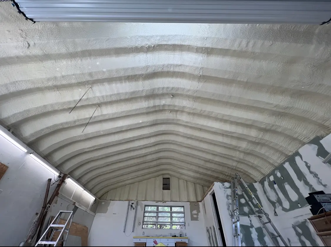 Spray polyurethane foam applied to the underside of a metal roof deck in Orinda
